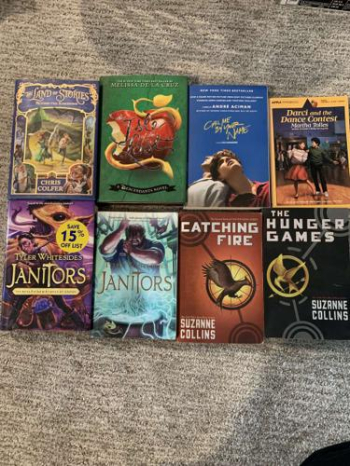  Set of 9 teen pre-teen books Hunger games, janitors in Midway, Utah