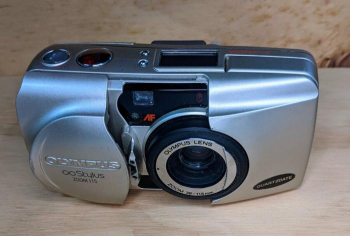 Olympus XA2 Rangefinder 35mm Film Camera w/ A11 Flash and Case - From JAPAN. New batteries have been installed and the camera tested. This vintage 35m