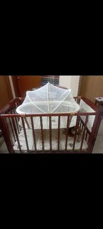 Baby cot just like new.